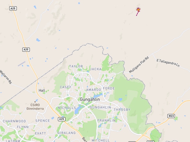 Une carte de Canberra montrant un petit symbole rouge d'un avion près de Sutton.