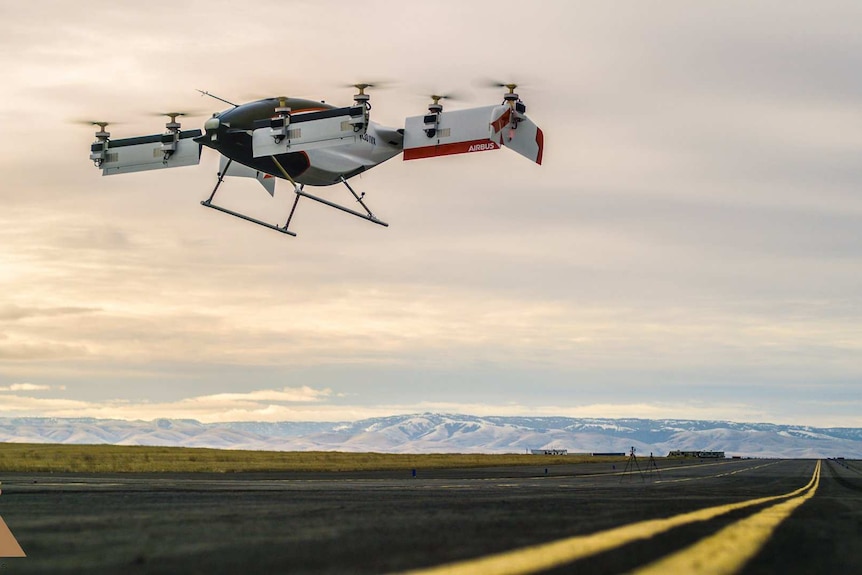 The Airbus Vahana flying car hovers above the ground during its first test flight in January 2018.