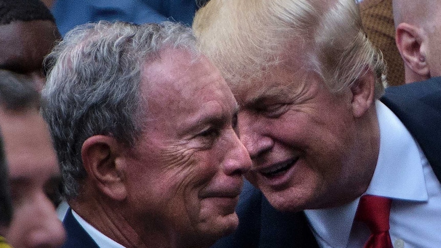 Then-New York mayor Michael Bloomberg talks with Donald Trump.