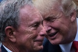 Then-New York mayor Michael Bloomberg talks with Donald Trump.