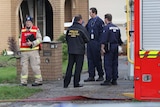 Fire brigade and police at fatal Melbourne fire scene