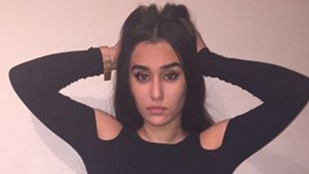 Aya Hishmeh poses in an Instagram photo, her hands in her hair.