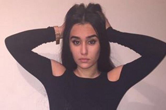 Aya Hishmeh poses in an instagram photo, her hands in her hair.