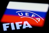 The FIFA and UEFA logos are displayed on the red, white and blue of the Russian flag.