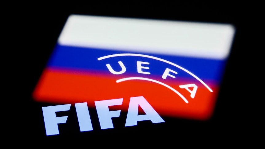 The FIFA and UEFA logos are displayed on the red, white and blue of the Russian flag.