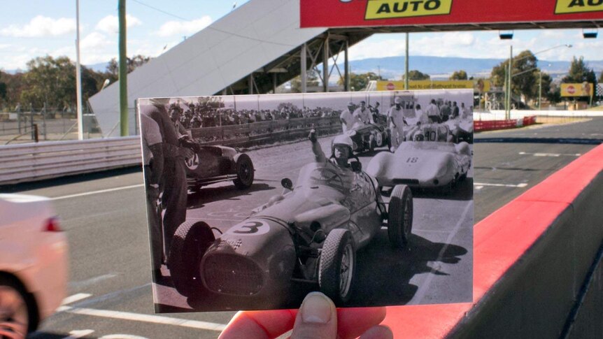 Jack Myers sits on the starting grid of a race and sports car event, Mount Panorama, possibly 1960.