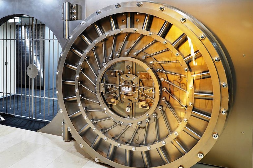 An open bank vault door 