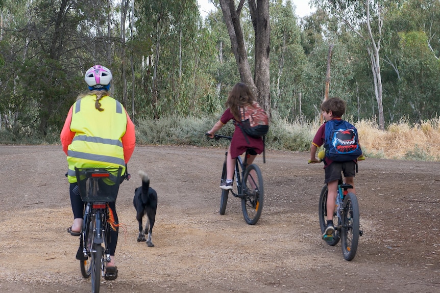 Kids riding bikes near Baram, Victoria, November 2023.