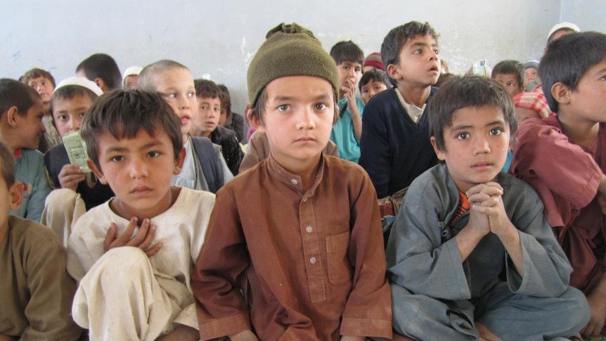 Afghan children attend school in Jawzjan province.