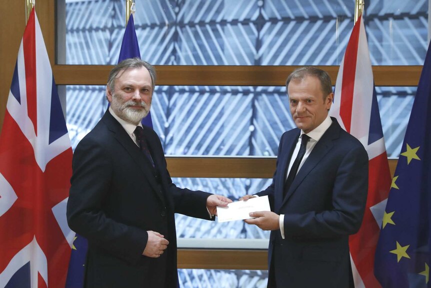 Tim Barrow hands the Brexit notice letter to Donald Tusk