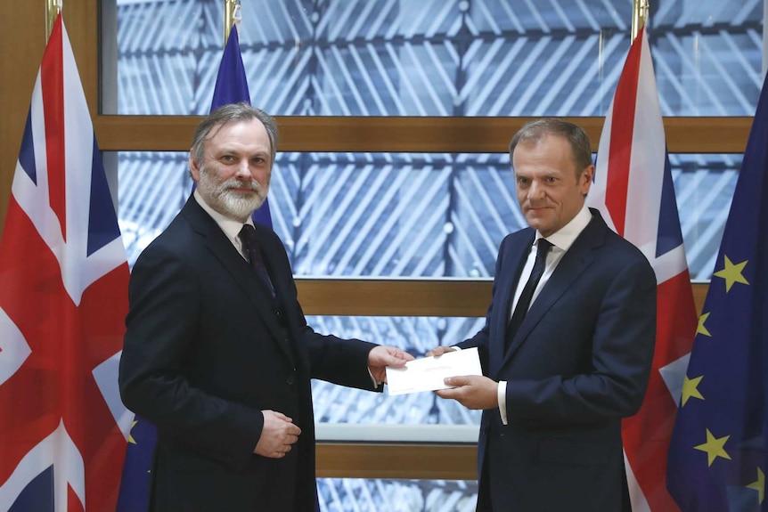 Tim Barrow hands the Brexit notice letter to Donald Tusk