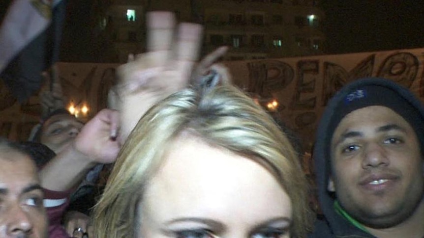 Lara Logan moves through Cairo's Tahrir Square moments before she was assaulted