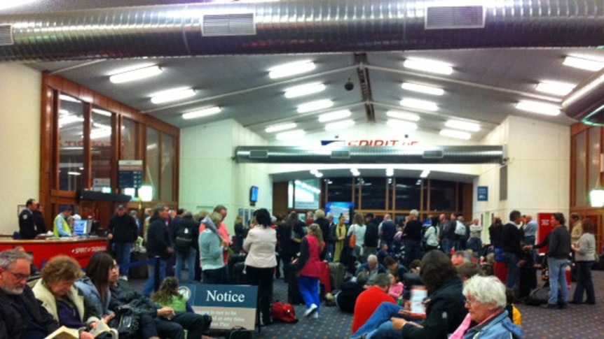 Passengers wait at Spirit of Tasmania ferry terminal in Melbourne