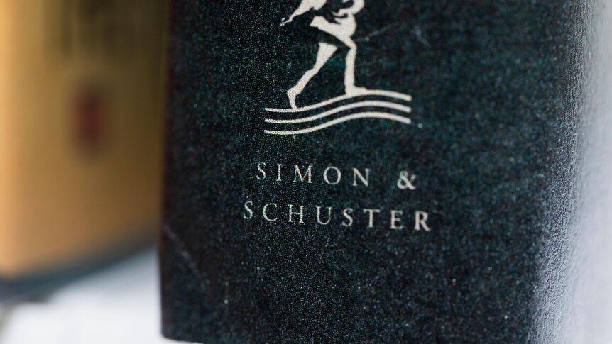 A book published by Simon & Schuster is displayed