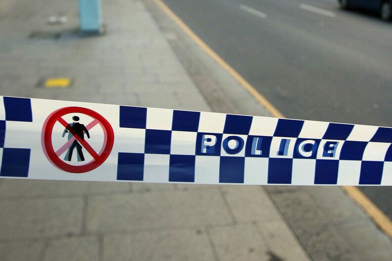 ACT police shot a man wielding an axe in Holder last night.