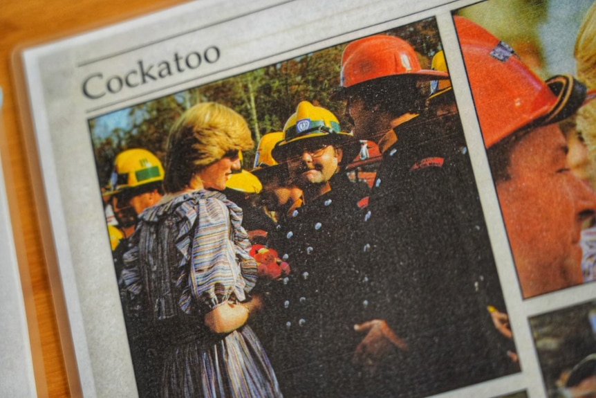 Princess Diana meets Country Fire Authority firefighters.