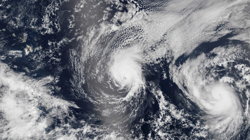 Tropical Storm Iselle and Hurricane Julio approach Hawaii