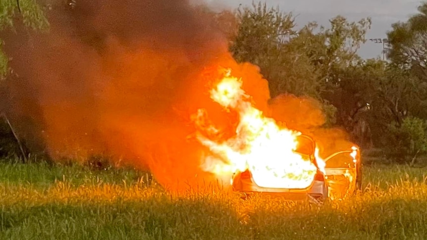 Image of a car that has been set on fire