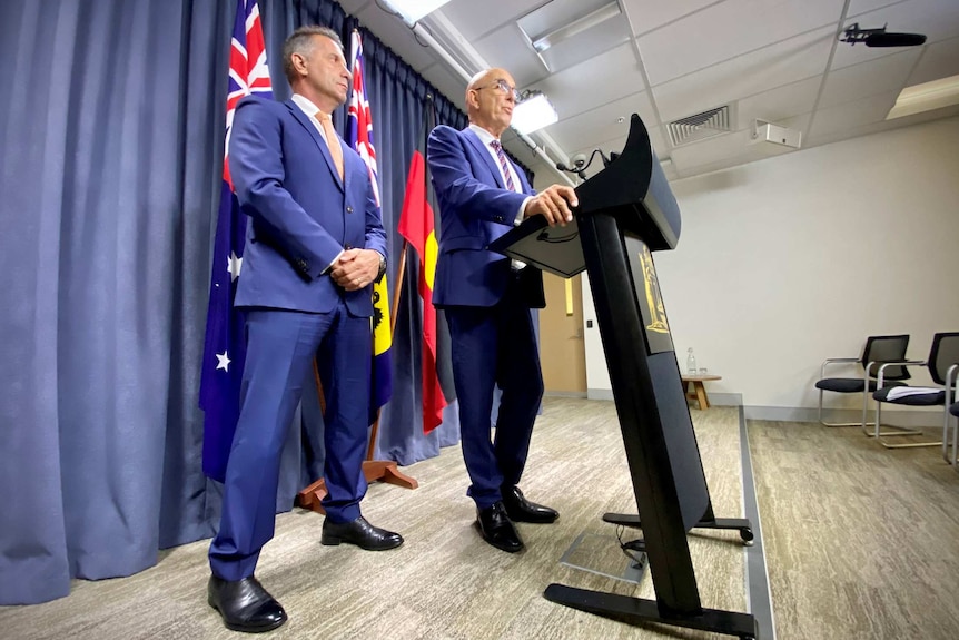 WA Racing and Gaming Minister Paul Papalia (left) and Attorney-General John Quigley standing at a media conference.