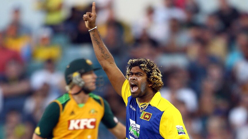 Lasith Malinga (1 for 26) celebrates the wicket of Cameron White (8) at the WACA Ground.