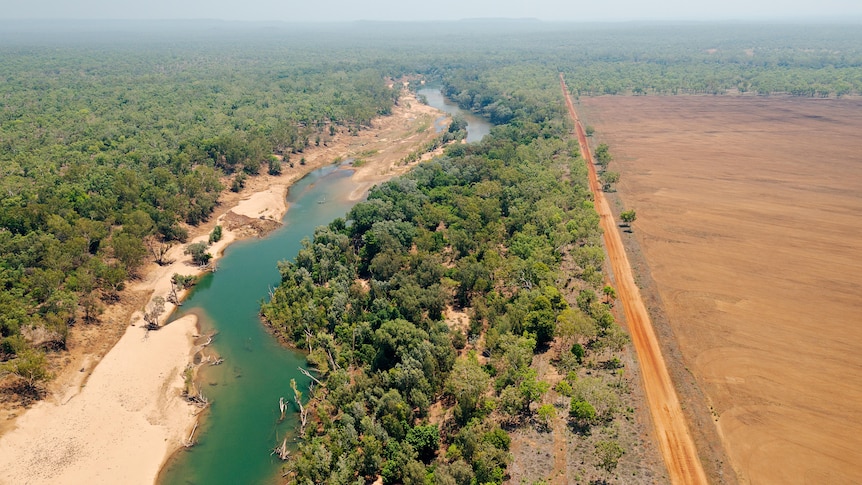 Aerial view of the Daly River next to Claravale Station where land has been cleared to make way for cotton crops.
