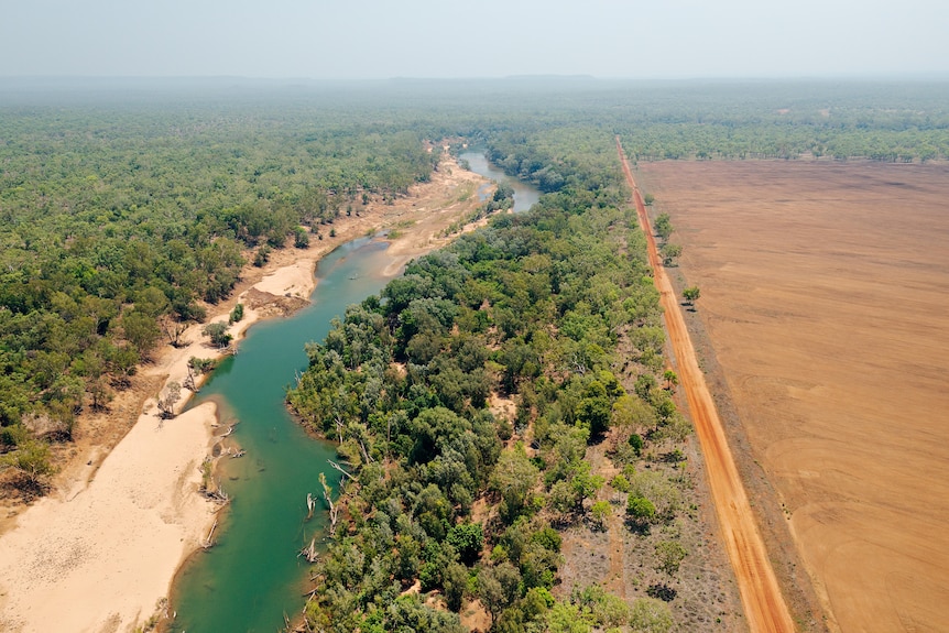 Aerial view of the Daly River next to Claravale Station where land has been cleared to make way for cotton crops.