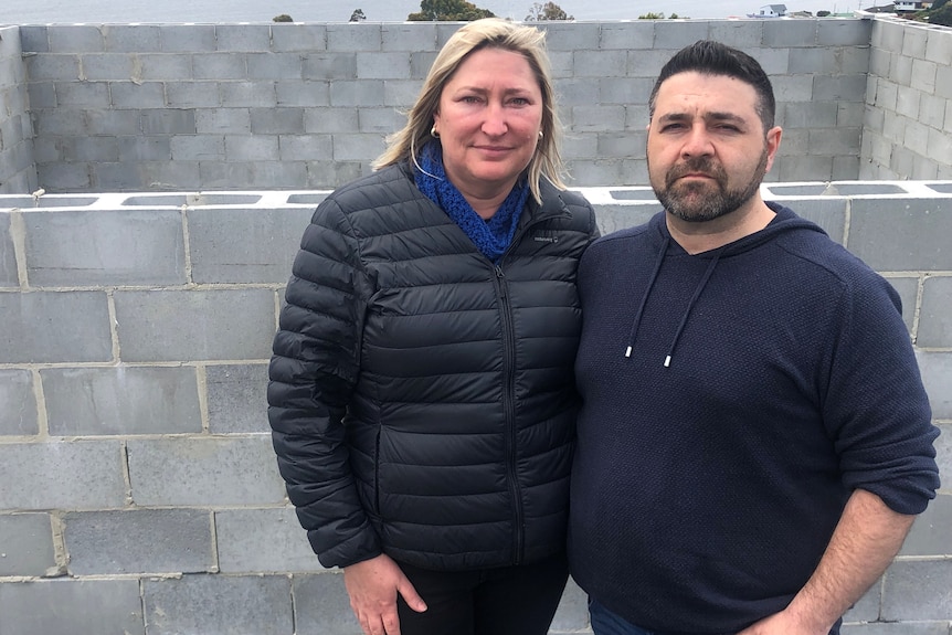 Rod and Kate Iskander at the construction site of their home.