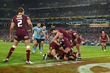Blues' Josh Morris (obscured) scores a try against Queensland in Origin I which is later overruled.