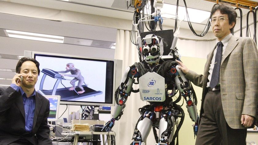 A Japanese humanoid robot controlled by signals from a monkey's brain on a treadmill.