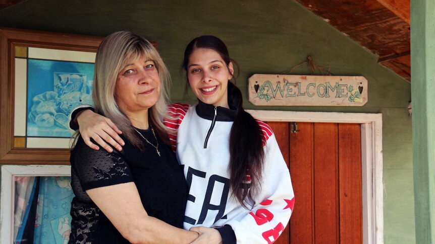 Chantelle Pellegrini and her mother Assunta Ariolo at the cubby house Chantelle's father built her before he passed away