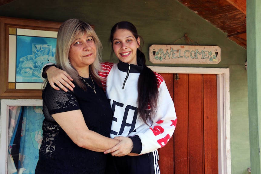 Chantelle Pellegrini and her mother Assunta Ariolo at the cubby house Chantelle's father built her before he passed away