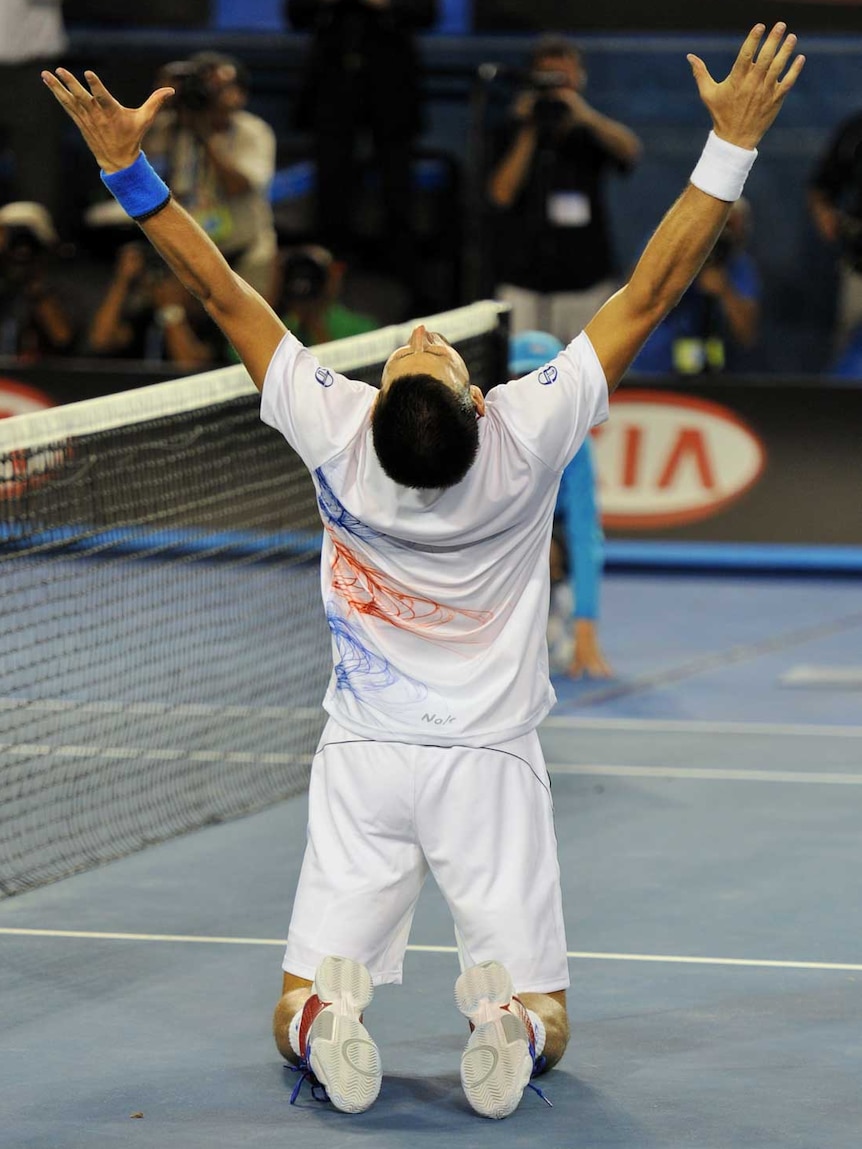 Djokovic collapses to his knees
