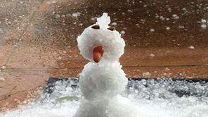 Snowman made of hail in Alice Springs