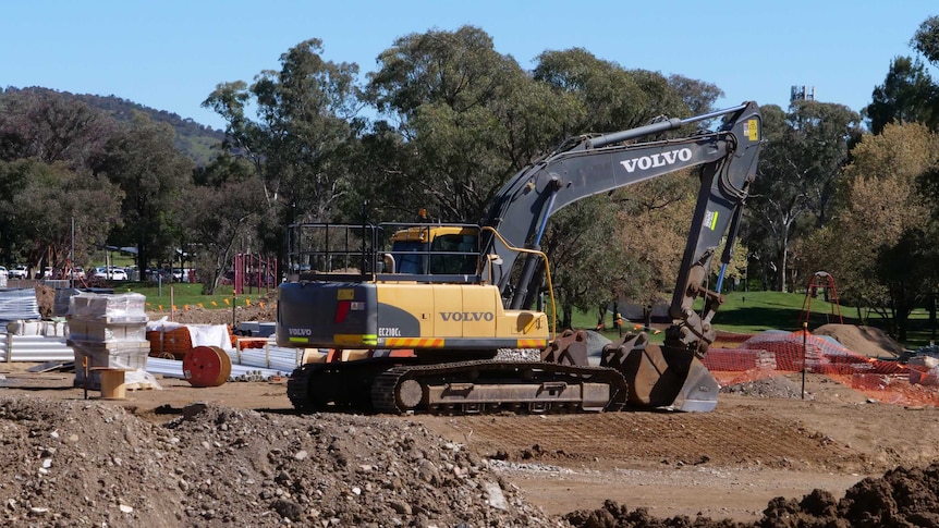 An excavator on a Canberra building site.