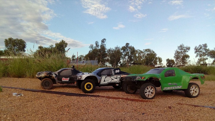 Remote control cars line up on the race track in Alice Springs.