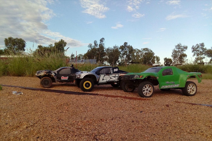 Remote control cars line up on the race track in Alice Springs.