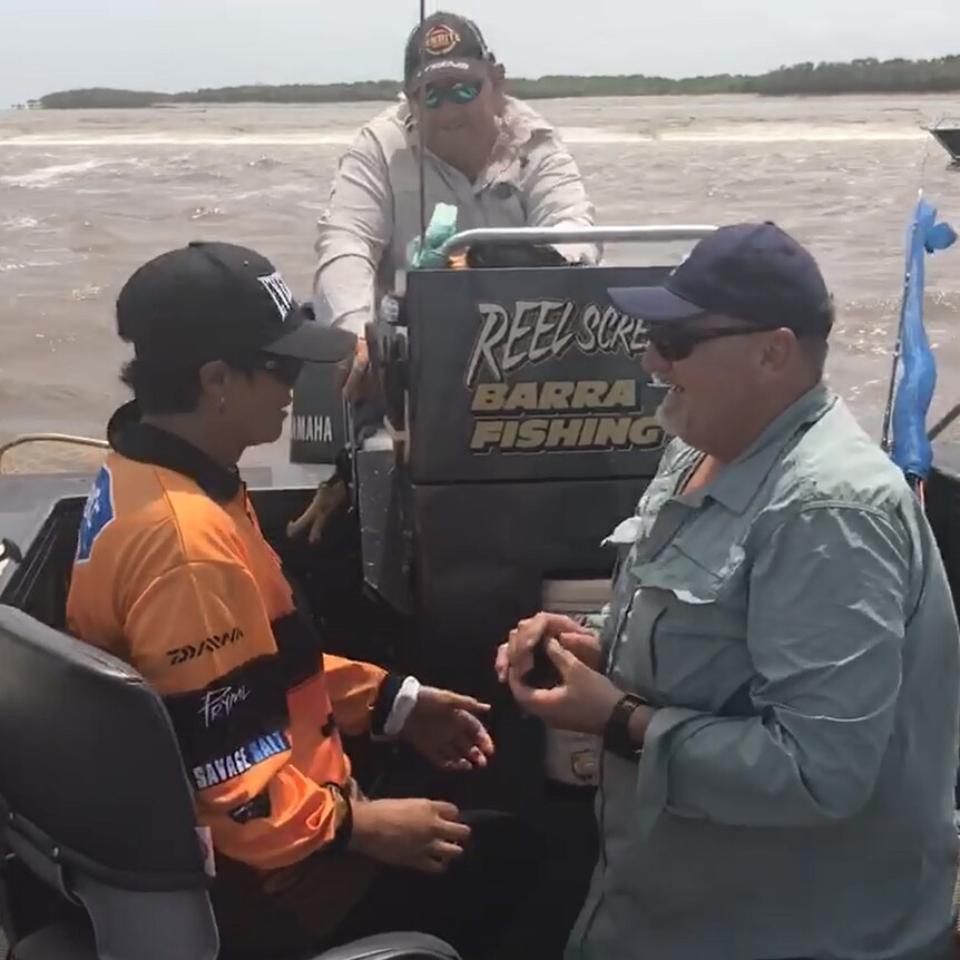 man proposes to wife on boat