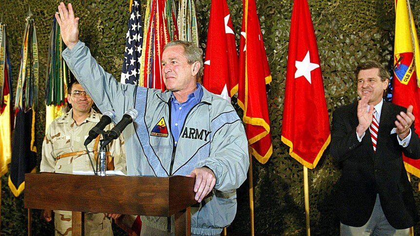 US president George W Bush arrives in Baghdad