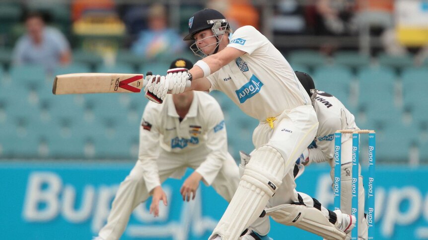 Looking for runs ... Steve Smith plays a shot against the Warriors