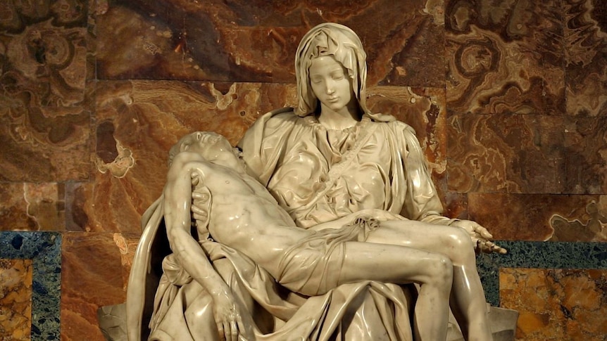 Marble statue of Mary holding the body of Jesus Christ.