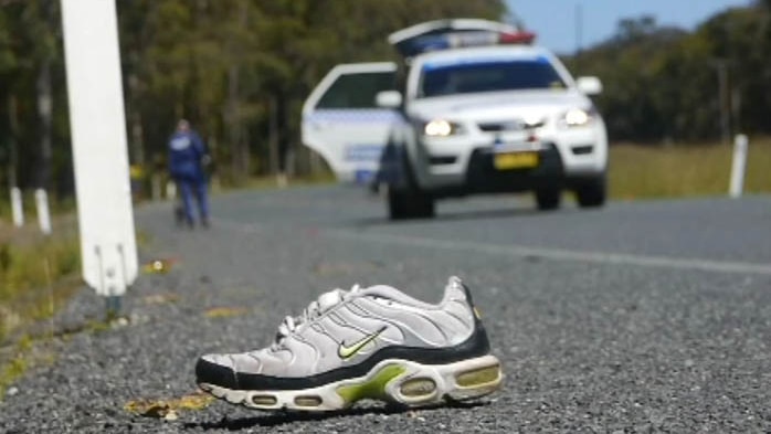 Shoe on highway where hitchhikers killed