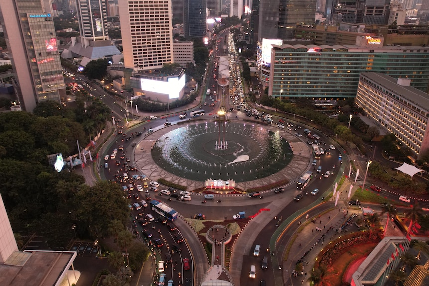 An above ground view of traffic backed up along a road in Jakarta during peak hour. 