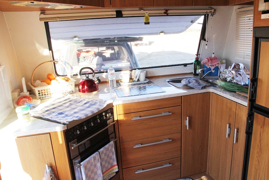 A kitchen in a mobile home.