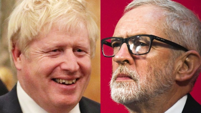 A composite image of Boris Johnson on the right, smiling, and Jeremy Corbyn on the left looking serious.