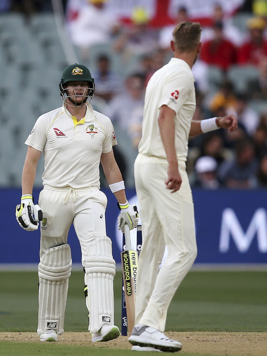 Australia's Steve Smith, left, and England's Stuart Broad have words mid-wicket