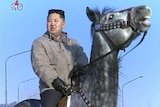 Kim Jong-un rides a horse