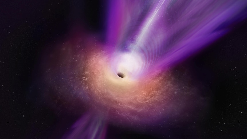 Image of a multi-coloured black hole in the shape of a donut with a white jet of light escaping from it