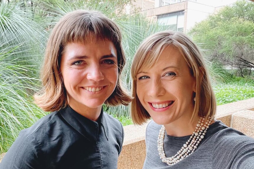 Two women smiling for a selfie