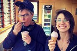 Australian comedian Hannah Gadsby and her wife Jenney Shamash eating ice cream.