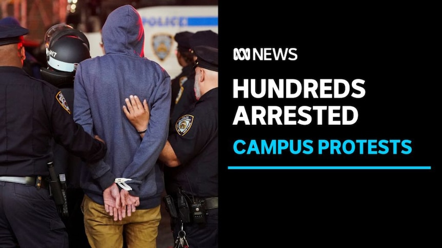 Hundreds Arrested, Campus Protests: A person in a hoodie with his hands cuffed is escorted by police officers.